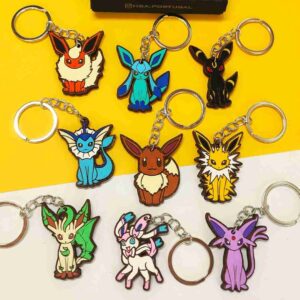 Porta-chaves Pokémon com Pikachu, Charizard, Bulbasaur, Eevee e outros personagens, em material durável e pintados à mão. | Pokémon keychains featuring Pikachu, Charizard, Bulbasaur, Eevee, and other characters, made from durable material and hand-painted