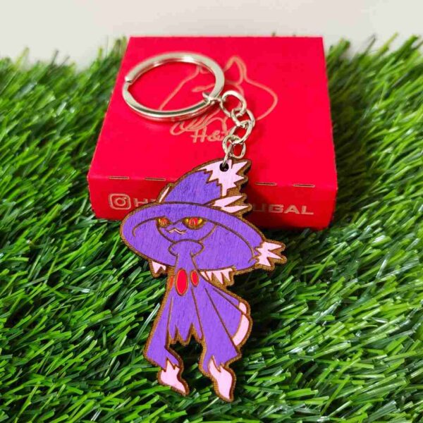 Porta-chaves Pokémon com Pikachu, Charizard, Bulbasaur, Eevee e outros personagens, em material durável e pintados à mão. | Pokémon keychains featuring Pikachu, Charizard, Bulbasaur, Eevee, and other characters, made from durable material and hand-painted