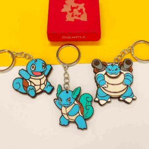 Porta-chaves Pokémon com Pikachu, Charizard, Bulbasaur, Eevee e outros personagens, em material durável e pintados à mão. | Pokémon keychains featuring Pikachu, Charizard, Bulbasaur, Eevee, and other characters, made from durable material and hand-painted